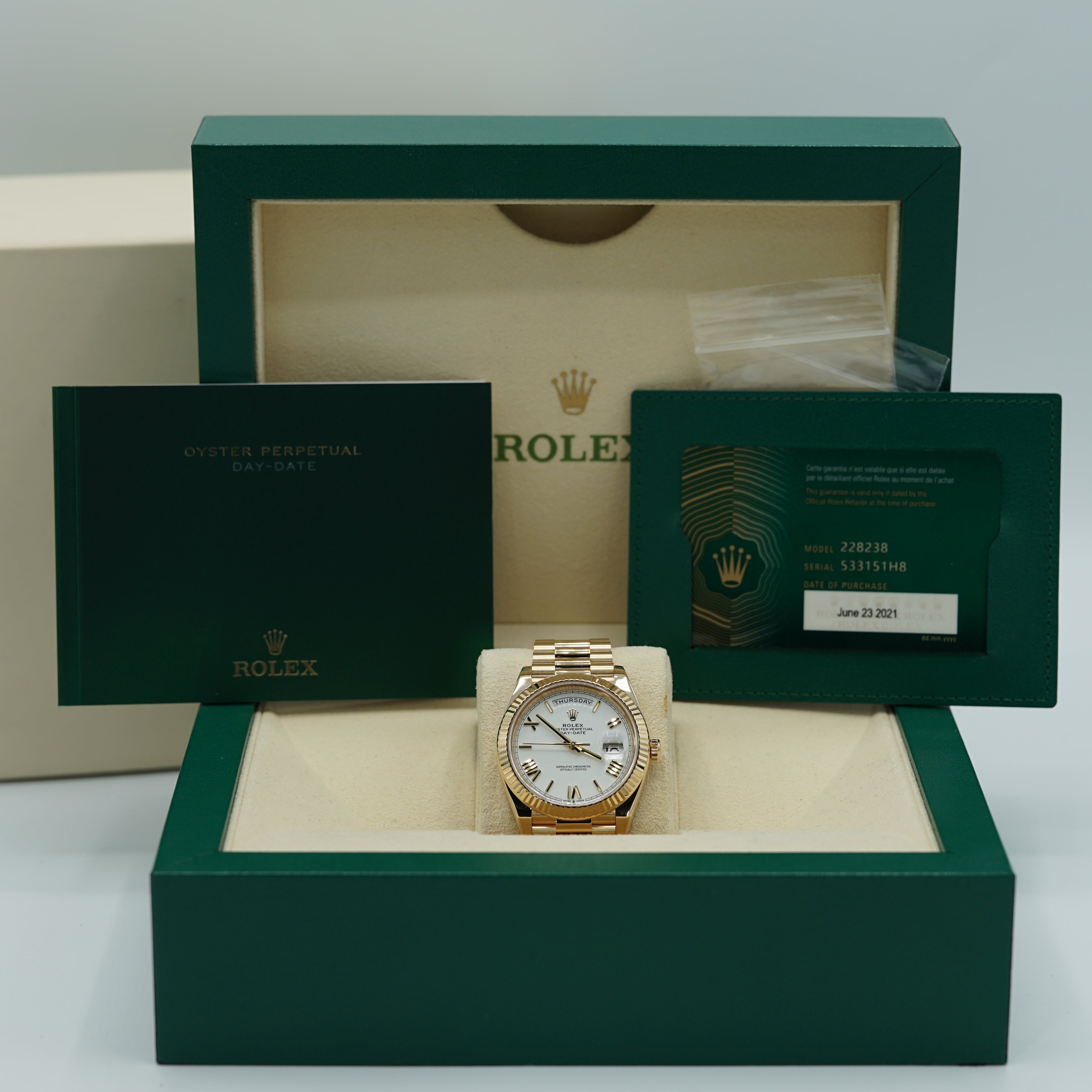Rolex Day-Date 40 mm White Dial 18k Yellow Gold President Bracelet 228