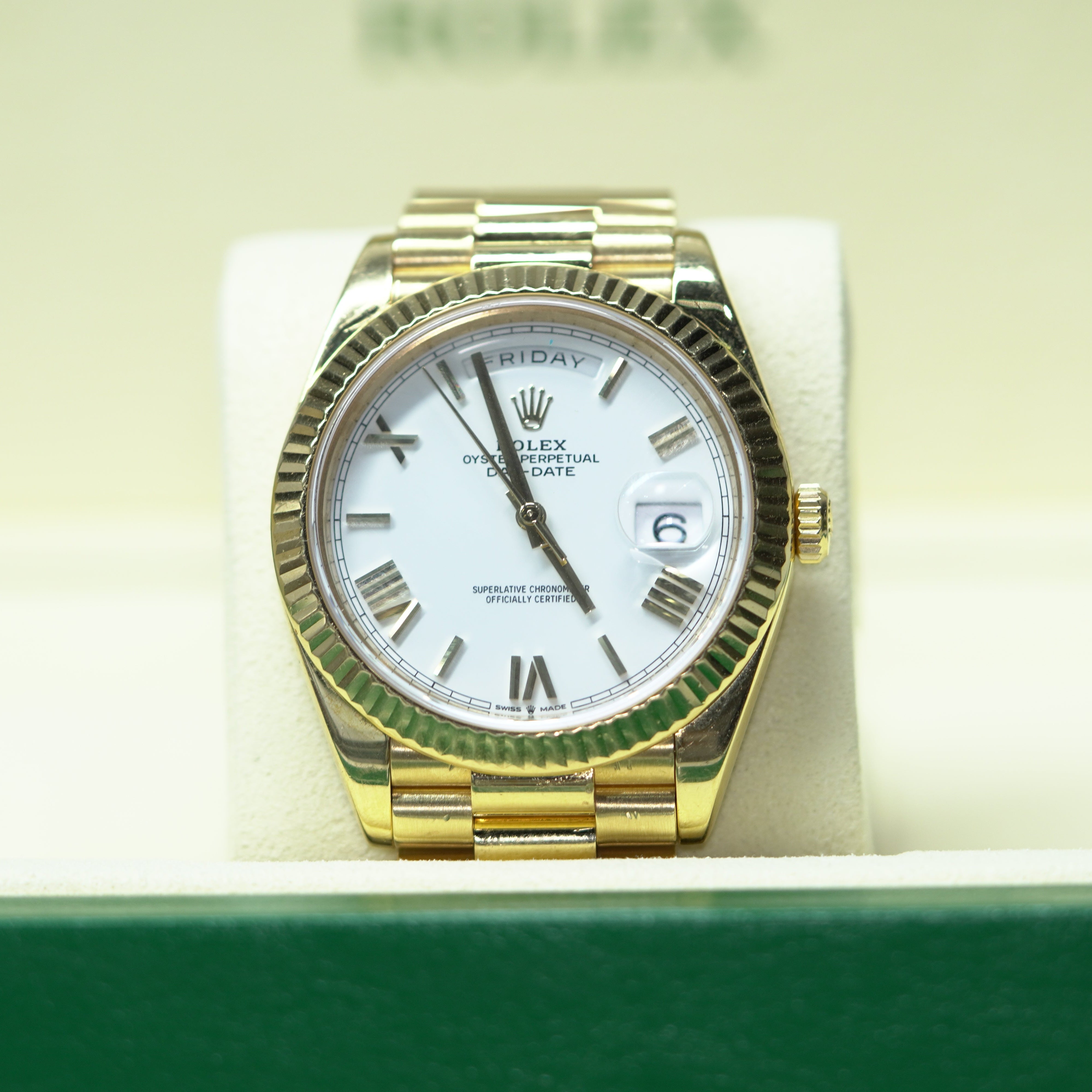 Rolex Day-Date 40 mm White Dial 18k Yellow Gold President Bracelet 228