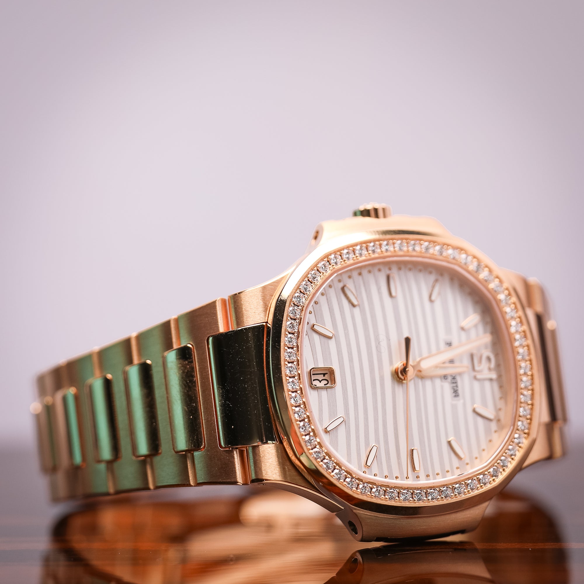 Patek Philippe Nautilus Rose Gold 35mm 7118/1200R - WATCHXNYC
