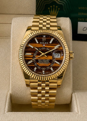 Rolex Sky-dweller Yellow Gold 42mm tiger eye Dial am Fluted Bezel Jubilee Bracelet