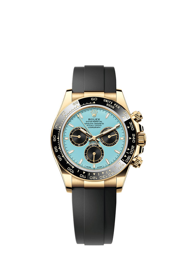 This Oyster Perpetual Cosmograph Daytona in 18 kt yellow gold, with a turquoise blue and black dial and an Oysterflex bracelet, features a black Cerachrom bezel with tachymetric scale. - WATCHXNYC